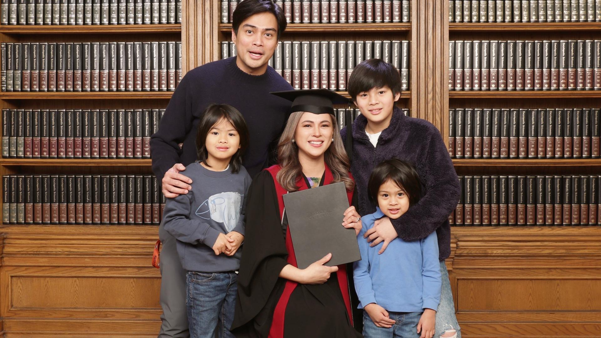 Langara ECE graduate Lara Quigaman with her family in a graduation portrait.