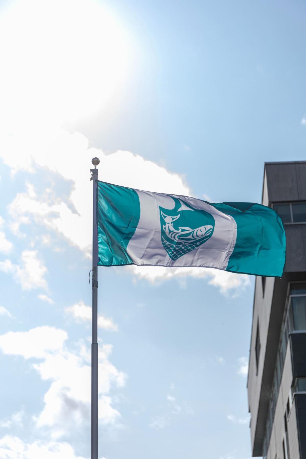 The Musqueam flag flying at Langara's main campus